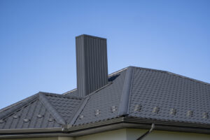 Grey Corrugated Metal Profile Roof Installed On A Modern House.